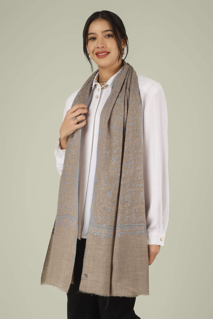 Hand-embroidered natural taupe pure Pashmina stole featuring an all-over sky-blue Sozni Jaldaar floral vine pattern from Kepra.
    
      | pashmina shawls online | authentic Kashmiri pashmina shawl online | pure pashmina shawl online | original GI certified pashmina shawl online | luxury men's pashmina shawl online from Kashmir | where to buy online pure pashmina in India
    
    | GI Tag Certified - Government-verified authentic Kashmiri Pashmina
    | G20 Official Partner - Selected by India for G20 Summit gifting
    | Handicraft Registered - Official recognition of traditional craftsmanship
    | Certificate of Authenticity - Every purchase includes GI certification