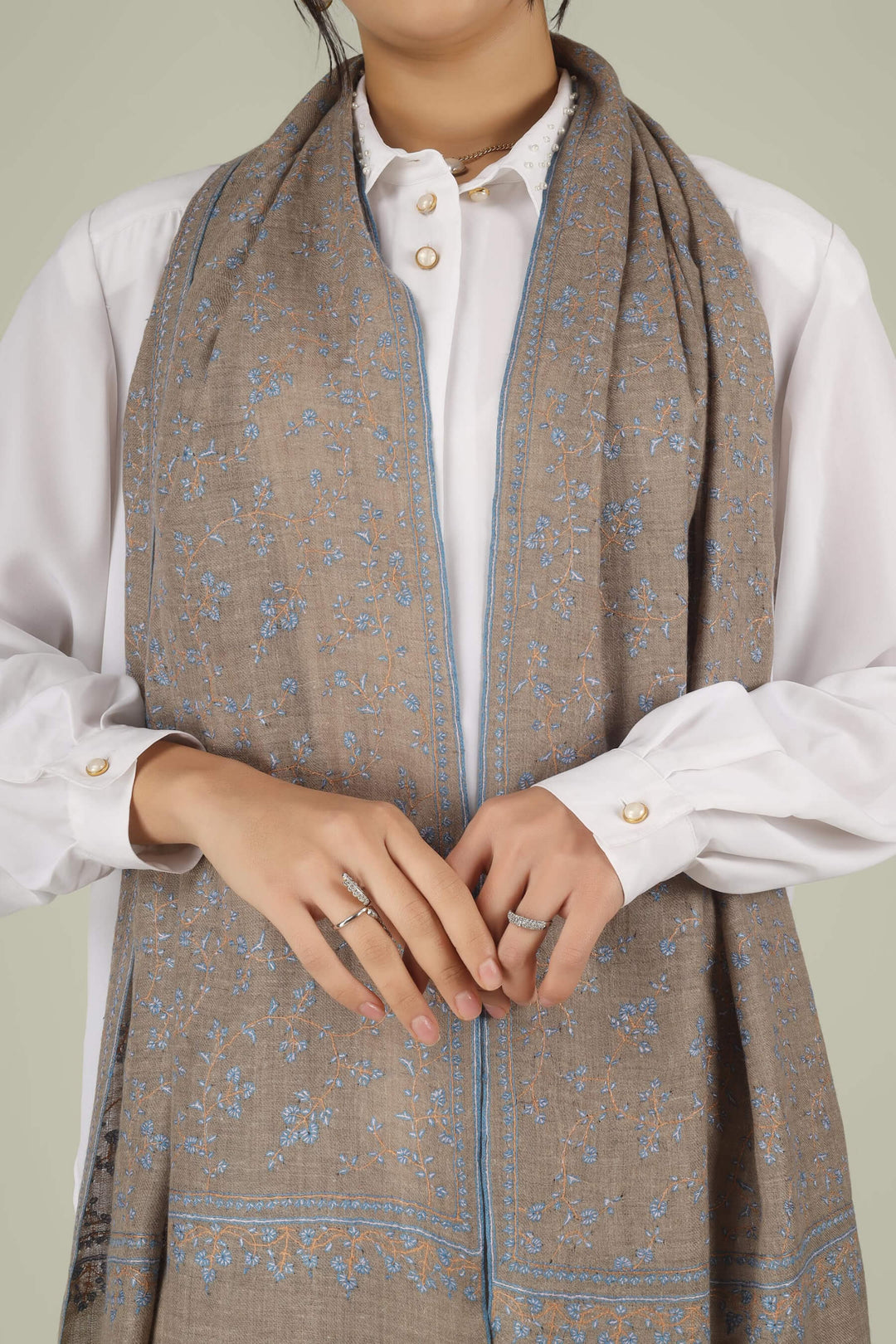 Hand-embroidered natural taupe pure Pashmina stole featuring an all-over sky-blue Sozni Jaldaar floral vine pattern from Kepra.