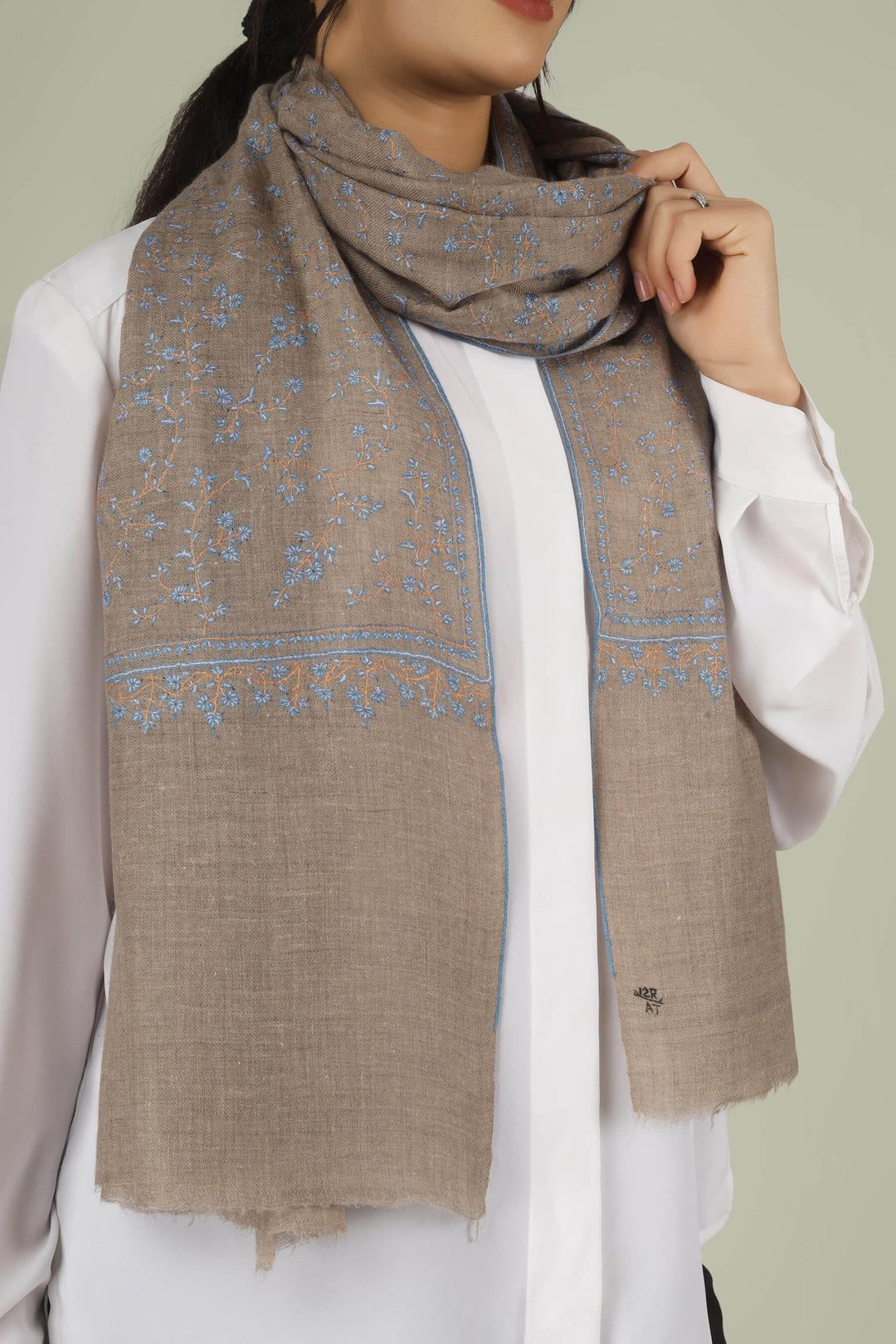 Hand-embroidered natural taupe pure Pashmina stole featuring an all-over sky-blue Sozni Jaldaar floral vine pattern from Kepra.