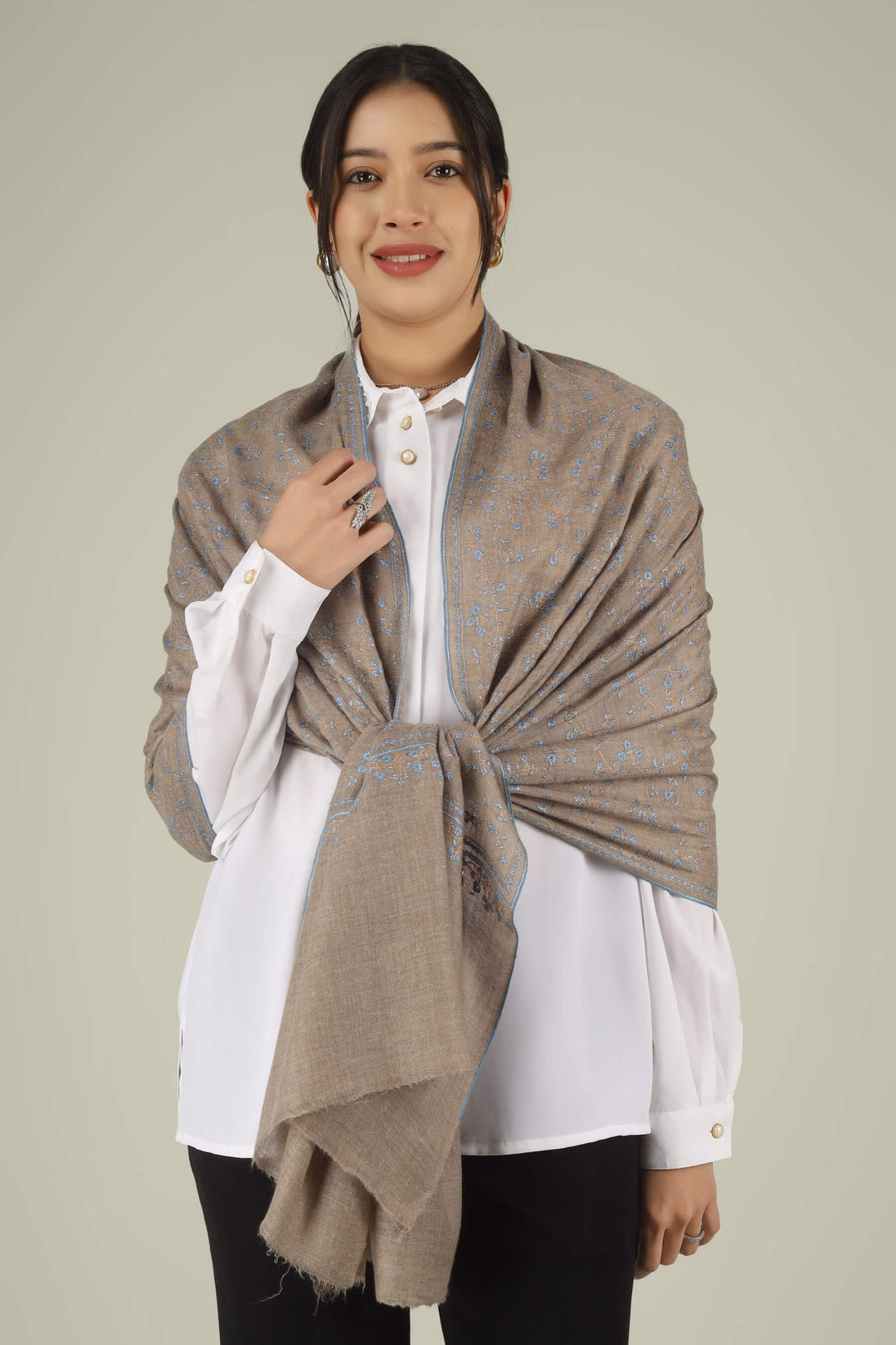 Hand-embroidered natural taupe pure Pashmina stole featuring an all-over sky-blue Sozni Jaldaar floral vine pattern from Kepra.