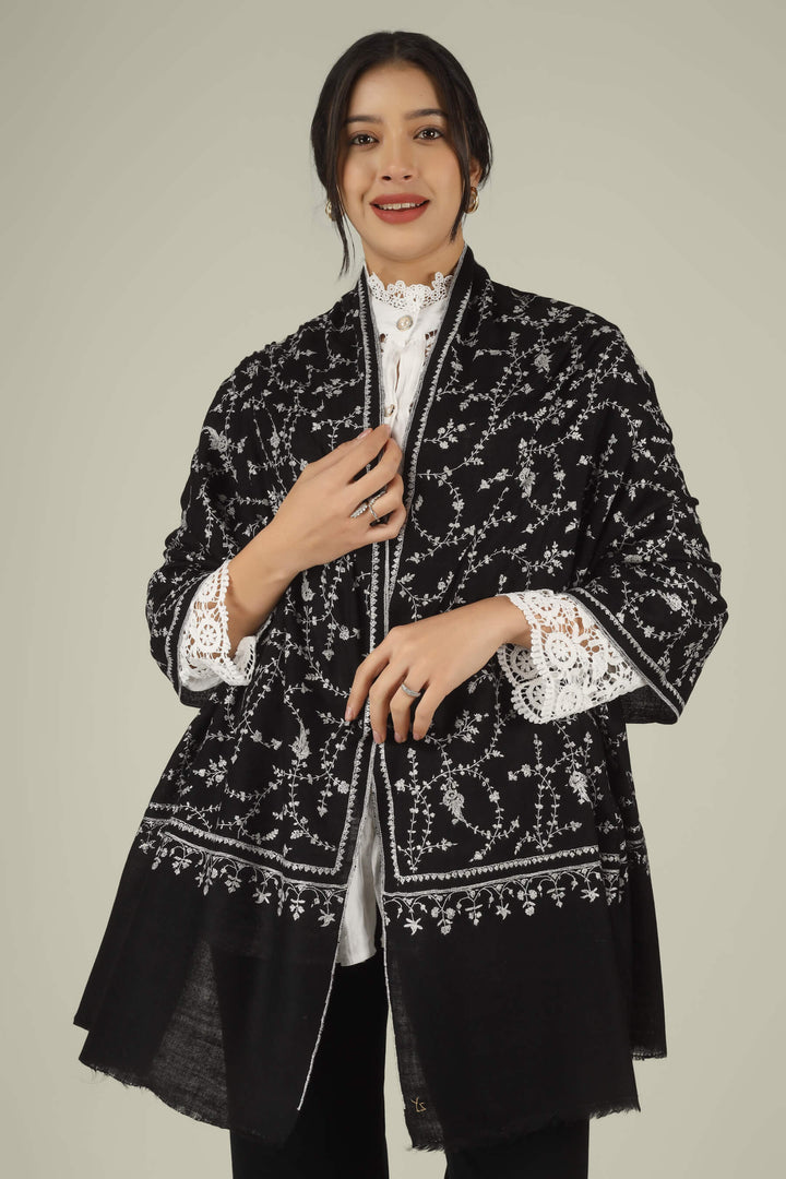 Hand-embroidered raven-black pure Pashmina stole featuring an all-over ivory Sozni Jaldaar floral vine pattern from Kepra.
    
      | pashmina shawls online | authentic Kashmiri pashmina shawl online | pure pashmina shawl online | original GI certified pashmina shawl online | luxury men's pashmina shawl online from Kashmir | where to buy online pure pashmina in India
    
    | GI Tag Certified - Government-verified authentic Kashmiri Pashmina
    | G20 Official Partner - Selected by India for G20 Summit gifting
    | Handicraft Registered - Official recognition of traditional craftsmanship
    | Certificate of Authenticity - Every purchase includes GI certification
