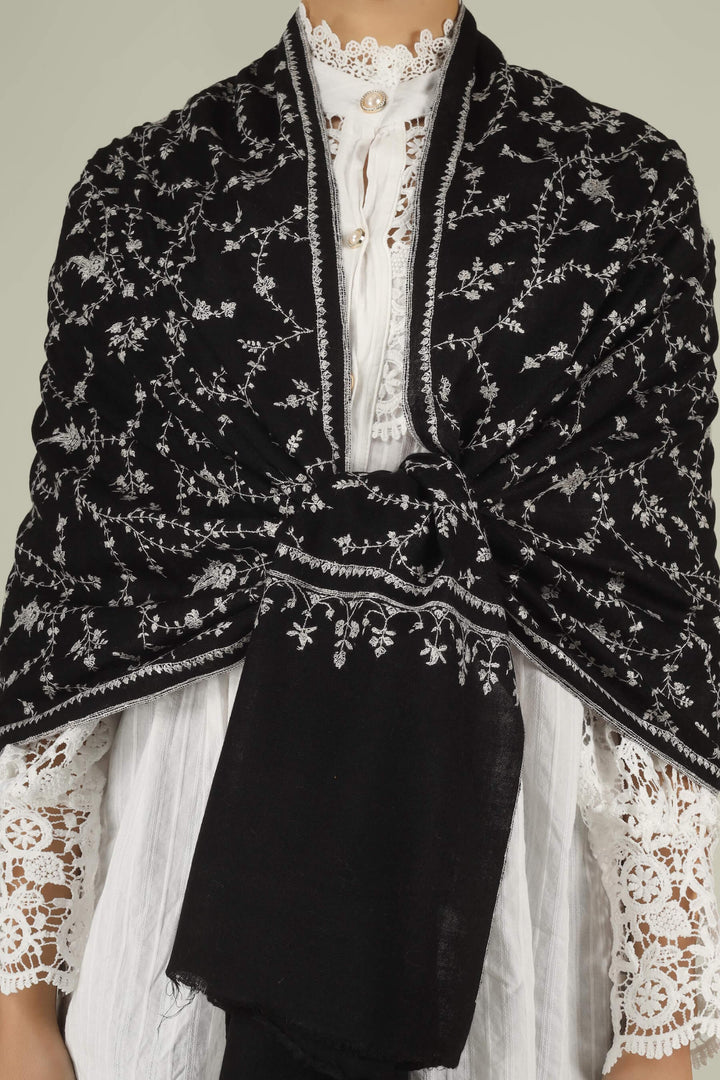 Hand-embroidered raven-black pure Pashmina stole featuring an all-over ivory Sozni Jaldaar floral vine pattern from Kepra.
    
      | pashmina shawls online | authentic Kashmiri pashmina shawl online | pure pashmina shawl online | original GI certified pashmina shawl online | luxury men's pashmina shawl online from Kashmir | where to buy online pure pashmina in India
    
    | GI Tag Certified - Government-verified authentic Kashmiri Pashmina
    | G20 Official Partner - Selected by India for G20 Summit gifting
    | Handicraft Registered - Official recognition of traditional craftsmanship
    | Certificate of Authenticity - Every purchase includes GI certification