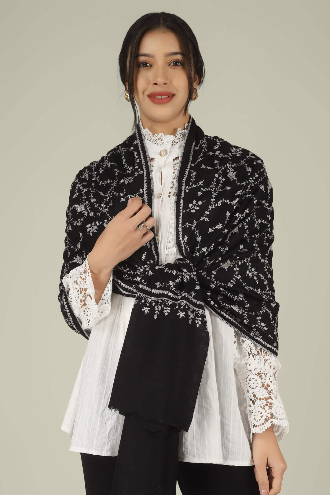 Hand-embroidered raven-black pure Pashmina stole featuring an all-over ivory Sozni Jaldaar floral vine pattern from Kepra.
