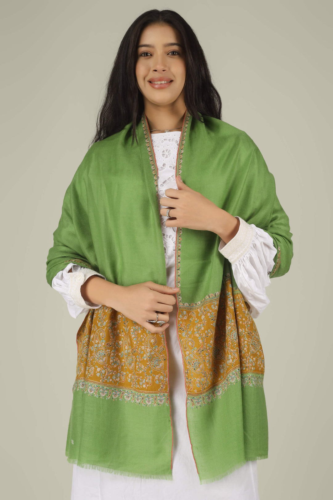 Hand-embroidered green and mustard-gold dual-tone pure Pashmina stole with multi-colored Sozni paisley needlework from Kepra.
