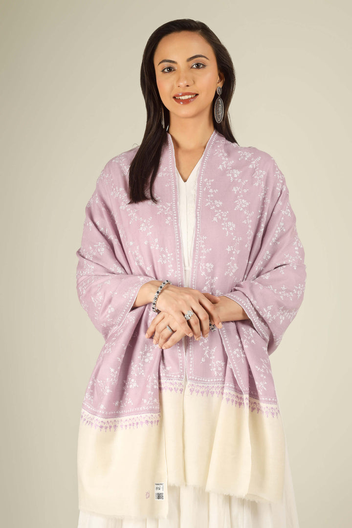 Lilac Kashmiri pure pashmina embroidered stole with cream base by Kepra, worn over white dress, front view for Rome winter styling
    
      | pashmina shawls online | authentic Kashmiri pashmina shawl online | pure pashmina shawl online | original GI certified pashmina shawl online | luxury men's pashmina shawl online from Kashmir | where to buy online pure pashmina in India
    
    | GI Tag Certified - Government-verified authentic Kashmiri Pashmina
    | G20 Official Partner - Selected by India for G20 Summit gifting
    | Handicraft Registered - Official recognition of traditional craftsmanship
    | Certificate of Authenticity - Every purchase includes GI certification