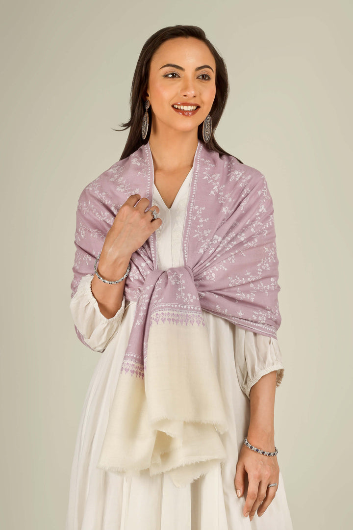 Lilac Kashmiri pure pashmina embroidered stole with cream base by Kepra, worn over white dress, front view for Rome winter styling
    
      | pashmina shawls online | authentic Kashmiri pashmina shawl online | pure pashmina shawl online | original GI certified pashmina shawl online | luxury men's pashmina shawl online from Kashmir | where to buy online pure pashmina in India
    
    | GI Tag Certified - Government-verified authentic Kashmiri Pashmina
    | G20 Official Partner - Selected by India for G20 Summit gifting
    | Handicraft Registered - Official recognition of traditional craftsmanship
    | Certificate of Authenticity - Every purchase includes GI certification