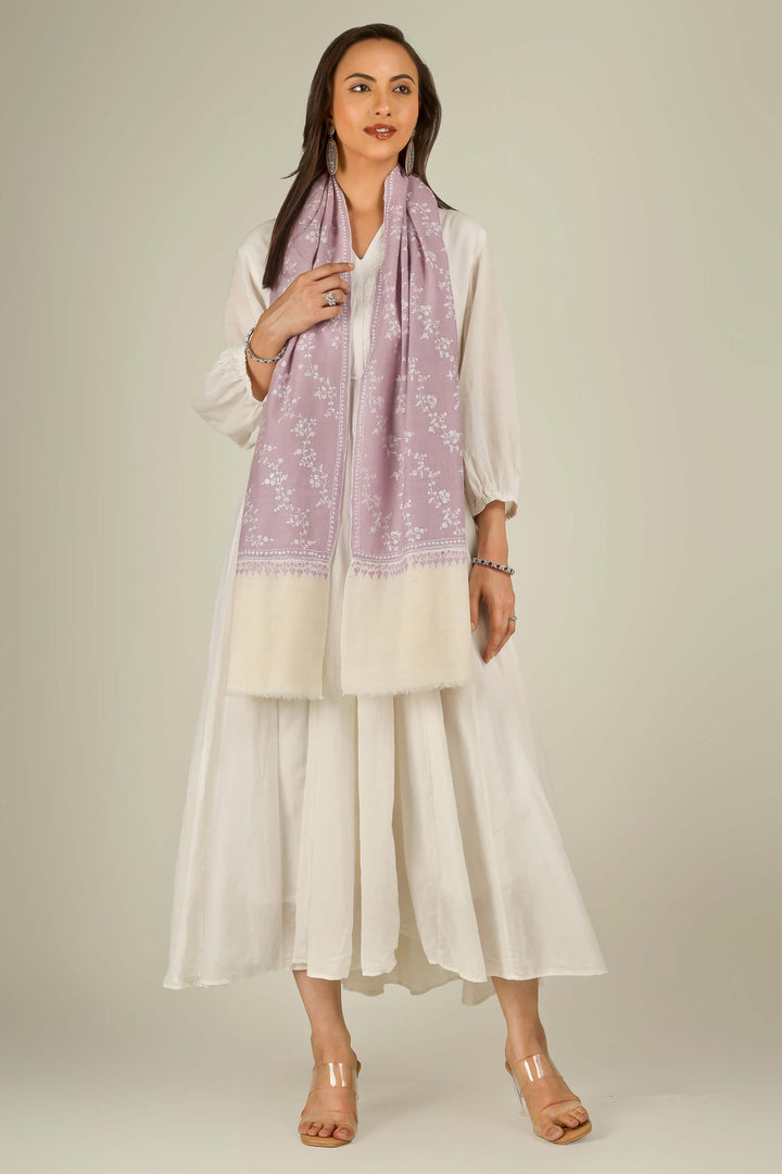 Lilac Kashmiri pure pashmina embroidered stole with cream base by Kepra, worn over white dress, front view for Rome winter styling
    
      | pashmina shawls online | authentic Kashmiri pashmina shawl online | pure pashmina shawl online | original GI certified pashmina shawl online | luxury men's pashmina shawl online from Kashmir | where to buy online pure pashmina in India
    
    | GI Tag Certified - Government-verified authentic Kashmiri Pashmina
    | G20 Official Partner - Selected by India for G20 Summit gifting
    | Handicraft Registered - Official recognition of traditional craftsmanship
    | Certificate of Authenticity - Every purchase includes GI certification