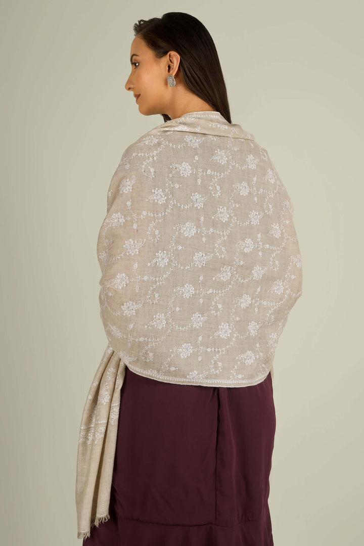 Beige GI Kashmiri pure pashmina embroidered stole by Kepra, draped on smiling model over plum dress, front view for Vienna winter styling
    
      | pashmina shawls online | authentic Kashmiri pashmina shawl online | pure pashmina shawl online | original GI certified pashmina shawl online | luxury men's pashmina shawl online from Kashmir | where to buy online pure pashmina in India
    
    | GI Tag Certified - Government-verified authentic Kashmiri Pashmina
    | G20 Official Partner - Selected by India for G20 Summit gifting
    | Handicraft Registered - Official recognition of traditional craftsmanship
    | Certificate of Authenticity - Every purchase includes GI certification