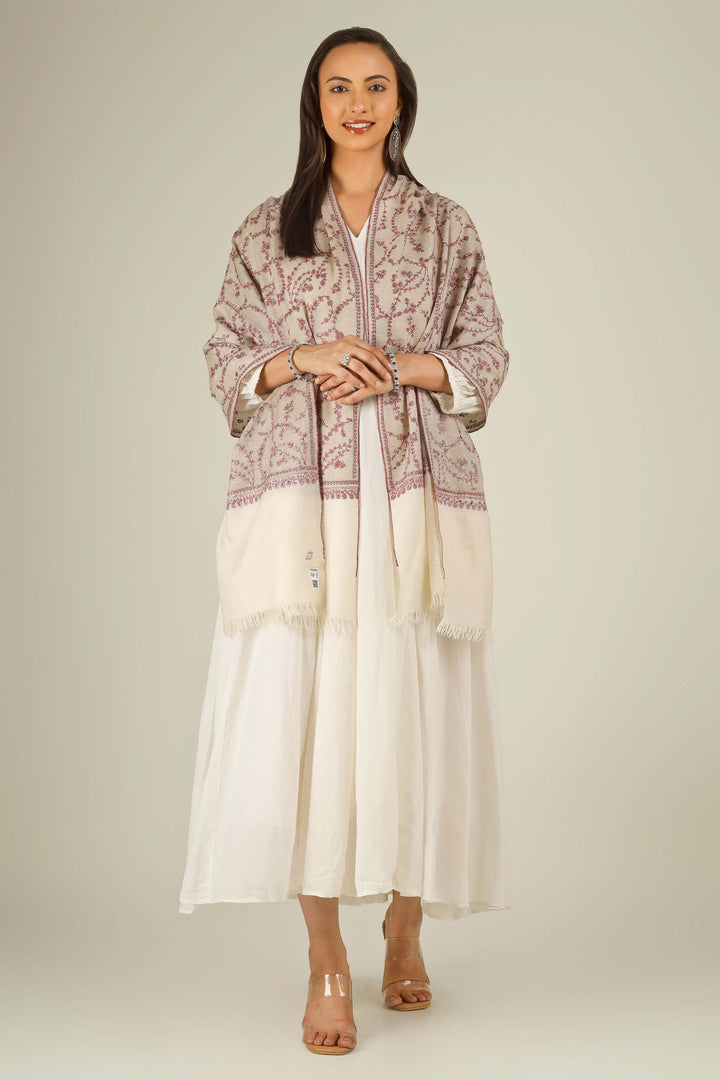 Close-up of beige Kashmiri pure pashmina stole with red sozni vine embroidery, held at the front, detail view for Berlin winter styling
    
      | pashmina shawls online | authentic Kashmiri pashmina shawl online | pure pashmina shawl online | original GI certified pashmina shawl online | luxury men's pashmina shawl online from Kashmir | where to buy online pure pashmina in India
    
    | GI Tag Certified - Government-verified authentic Kashmiri Pashmina
    | G20 Official Partner - Selected by India for G20 Summit gifting
    | Handicraft Registered - Official recognition of traditional craftsmanship
    | Certificate of Authenticity - Every purchase includes GI certification