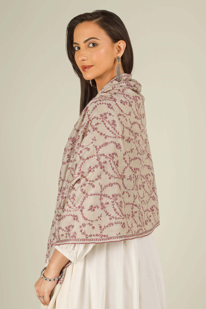 Close-up of beige Kashmiri pure pashmina stole with red sozni vine embroidery, held at the front, detail view for Berlin winter styling
    
      | pashmina shawls online | authentic Kashmiri pashmina shawl online | pure pashmina shawl online | original GI certified pashmina shawl online | luxury men's pashmina shawl online from Kashmir | where to buy online pure pashmina in India
    
    | GI Tag Certified - Government-verified authentic Kashmiri Pashmina
    | G20 Official Partner - Selected by India for G20 Summit gifting
    | Handicraft Registered - Official recognition of traditional craftsmanship
    | Certificate of Authenticity - Every purchase includes GI certification