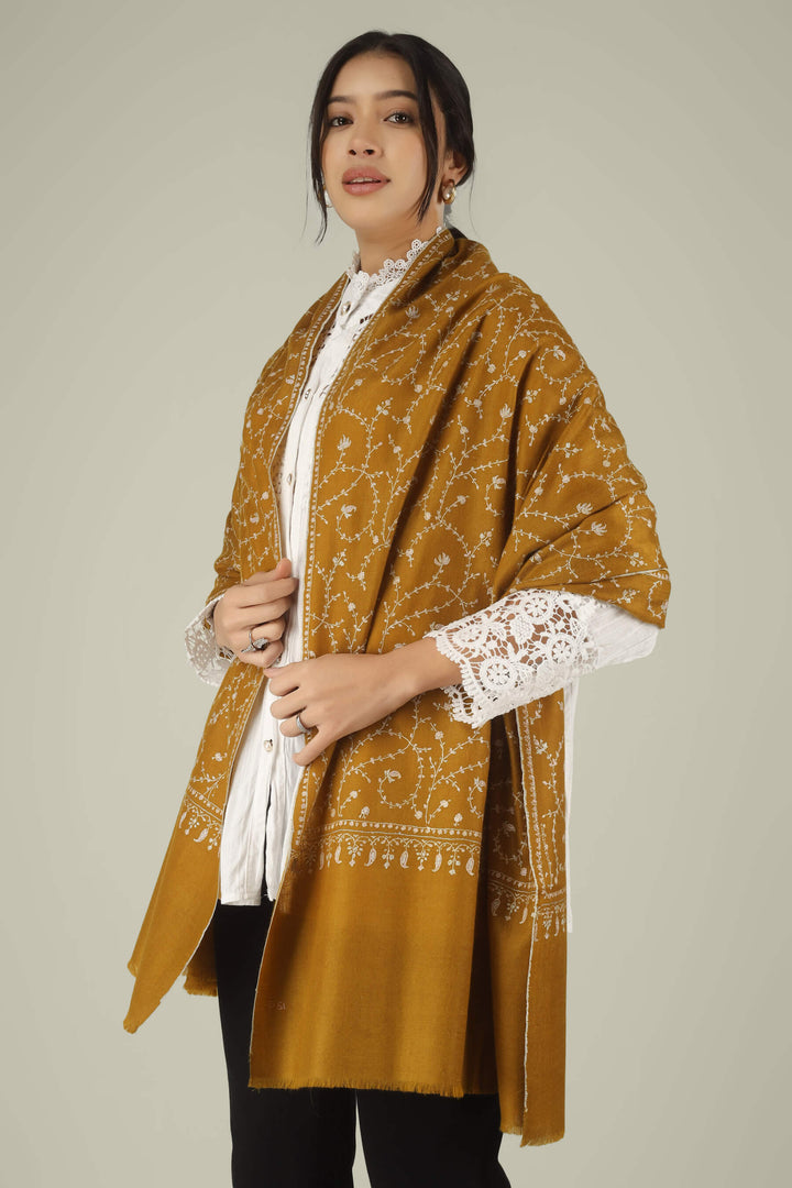 Hand-embroidered mustard gold pure Pashmina stole with ivory-white Jaldaar Sozni floral vine embroidery from Kepra.
    
      | pashmina shawls online | authentic Kashmiri pashmina shawl online | pure pashmina shawl online | original GI certified pashmina shawl online | luxury men's pashmina shawl online from Kashmir | where to buy online pure pashmina in India
    
    | GI Tag Certified - Government-verified authentic Kashmiri Pashmina
    | G20 Official Partner - Selected by India for G20 Summit gifting
    | Handicraft Registered - Official recognition of traditional craftsmanship
    | Certificate of Authenticity - Every purchase includes GI certification
