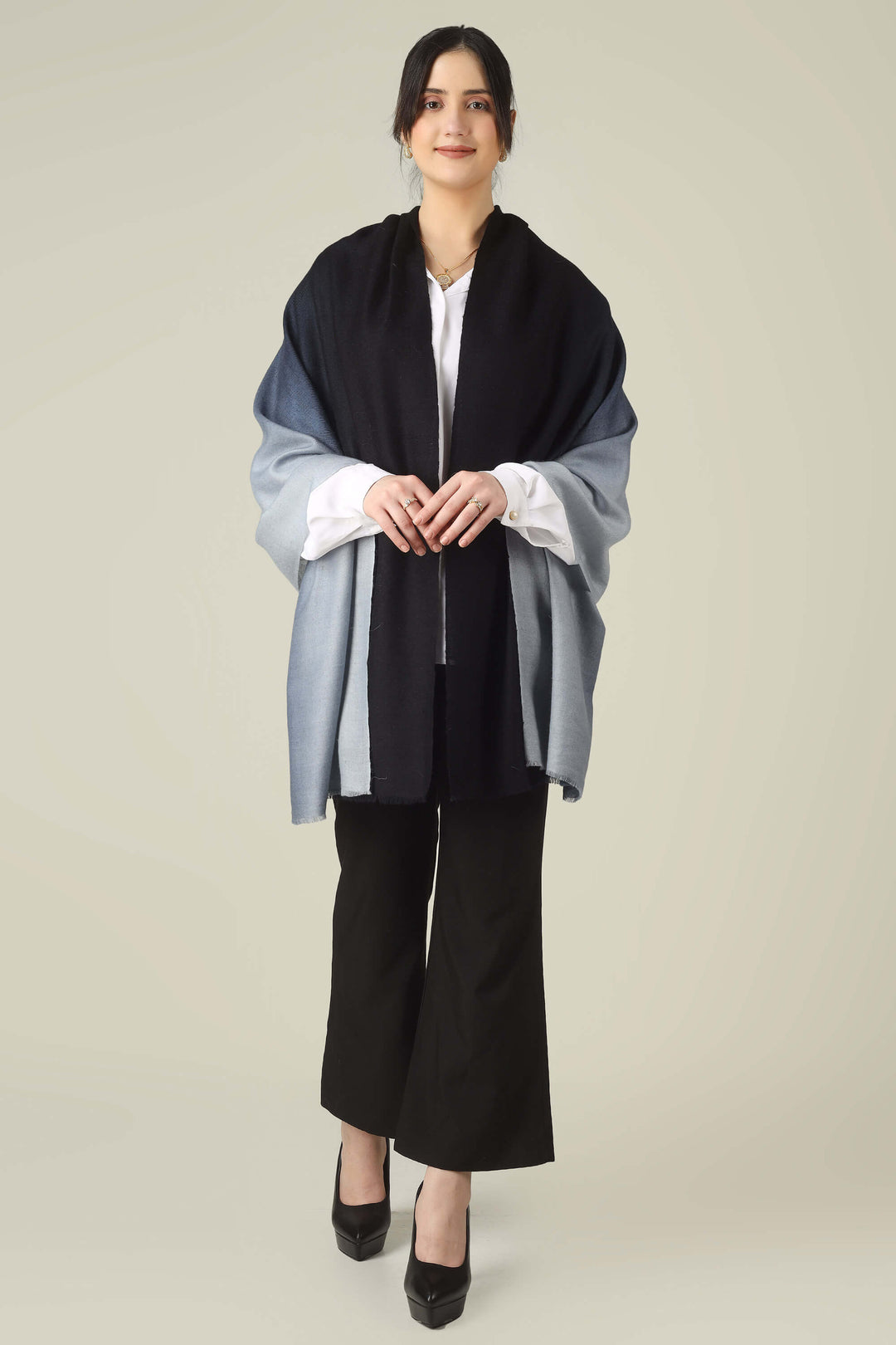 Ideal for customers searching for pashmina online, this black and grey ombre stole is a smart choice for boardrooms and business trips from India to Germany.