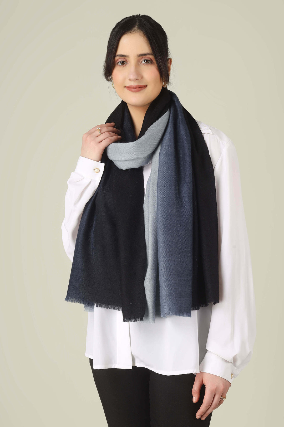 Ideal for customers searching for pashmina online, this black and grey ombre stole is a smart choice for boardrooms and business trips from India to Germany.