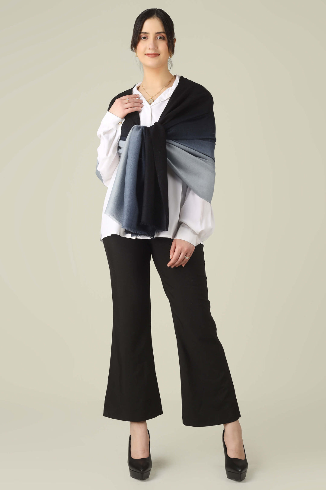 Ideal for customers searching for pashmina online, this black and grey ombre stole is a smart choice for boardrooms and business trips from India to Germany.