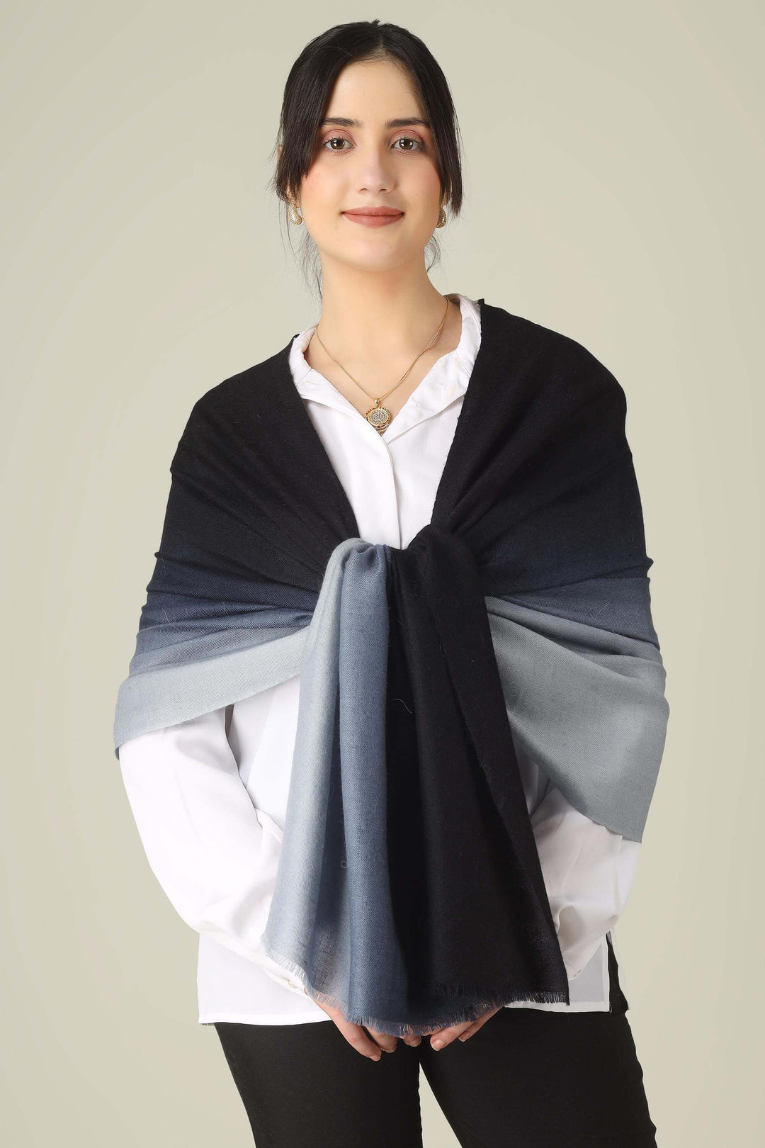 Ideal for customers searching for pashmina online, this black and grey ombre stole is a smart choice for boardrooms and business trips from India to Germany.