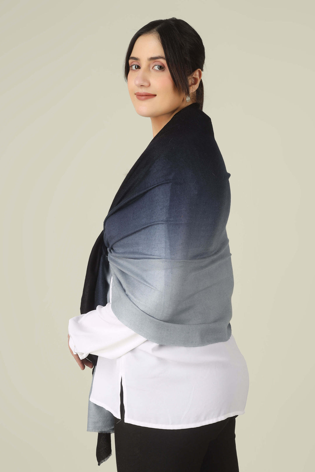 Ideal for customers searching for pashmina online, this black and grey ombre stole is a smart choice for boardrooms and business trips from India to Germany.