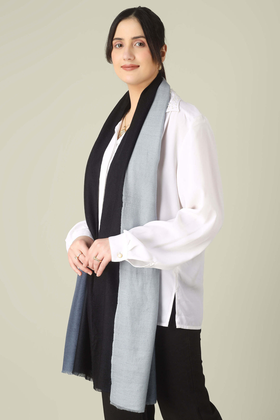 Ideal for customers searching for pashmina online, this black and grey ombre stole is a smart choice for boardrooms and business trips from India to Germany.