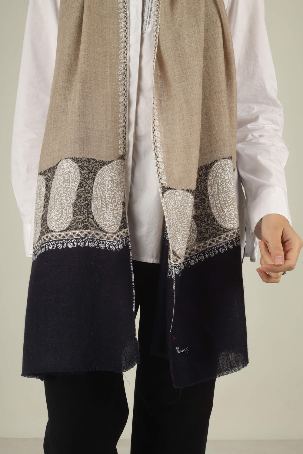 Hand-embroidered beige and black dual-tone pure Pashmina stole with ivory Sozni paisley motifs on the borders from Kepra