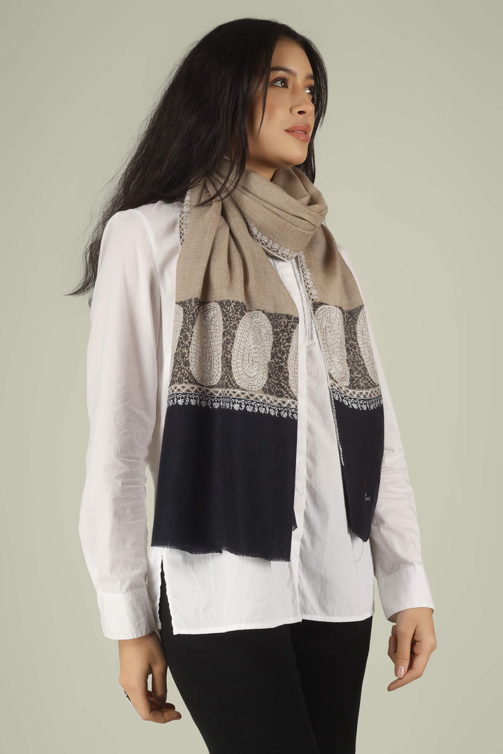 Hand-embroidered beige and black dual-tone pure Pashmina stole with ivory Sozni paisley motifs on the borders from Kepra
    
      | pashmina shawls online | authentic Kashmiri pashmina shawl online | pure pashmina shawl online | original GI certified pashmina shawl online | luxury men's pashmina shawl online from Kashmir | where to buy online pure pashmina in India
    
    | GI Tag Certified - Government-verified authentic Kashmiri Pashmina
    | G20 Official Partner - Selected by India for G20 Summit gifting
    | Handicraft Registered - Official recognition of traditional craftsmanship
    | Certificate of Authenticity - Every purchase includes GI certification