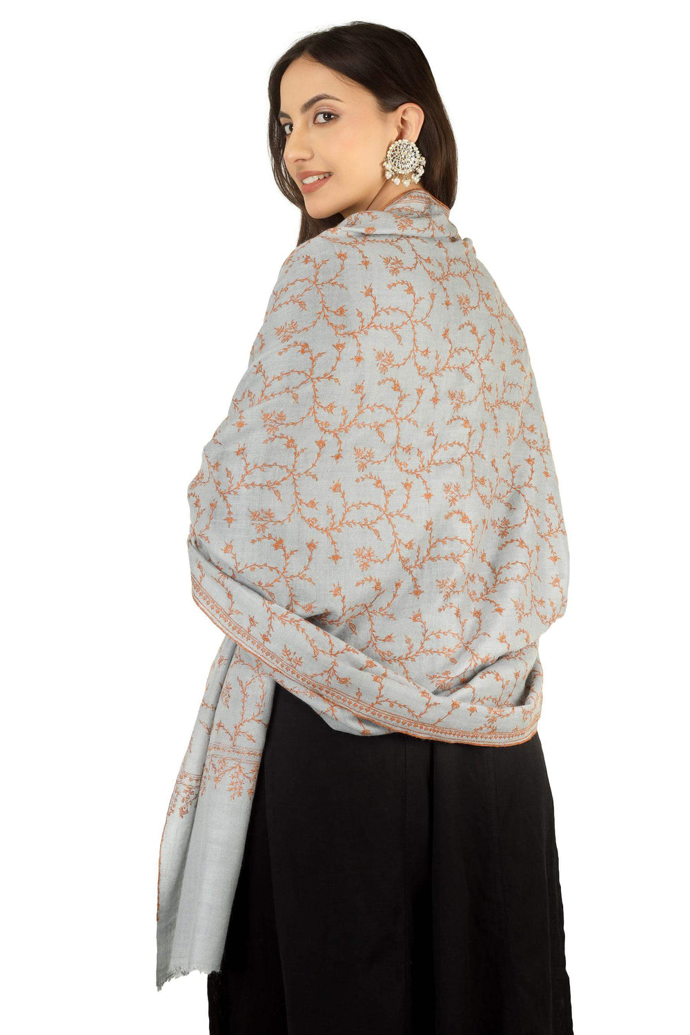 A refined choice for admirers of pashmina shawls in Newyork, this handwoven jaal shawl brings authentic Kashmiri craftsmanship