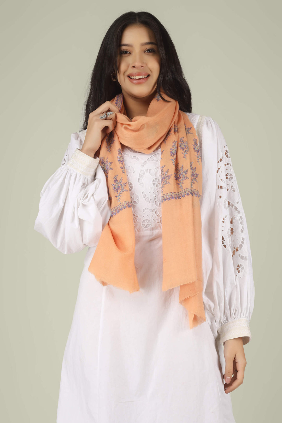 100% pure Pashmina stole, a masterpiece of Kashmiri craft that defines modern luxury. Weighing next to nothing, this feather-light accessory is hand-woven
