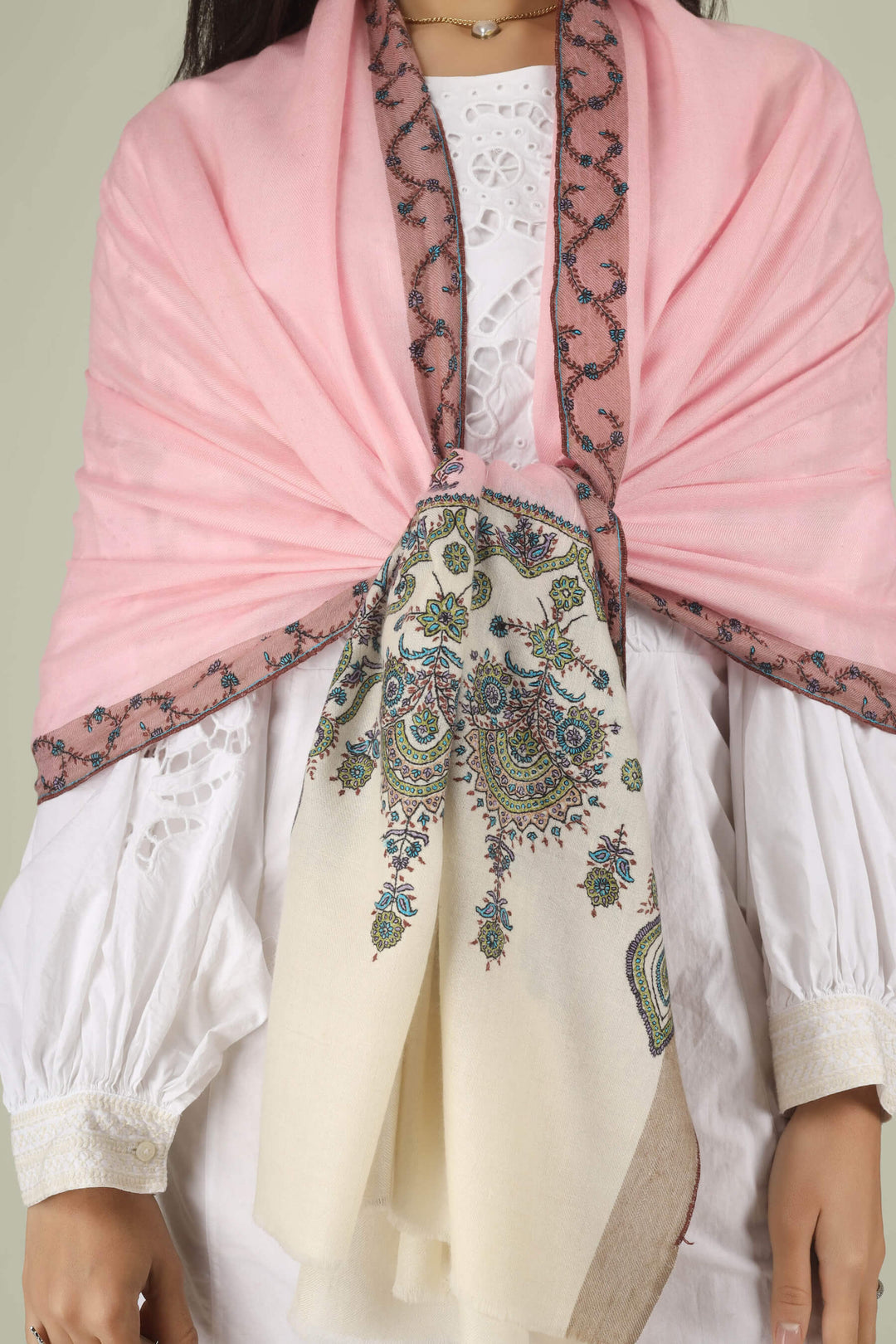 Hand-embroidered pink and white dual-tone pure Pashmina stole with multi-colored floral Sozni needlework from Kepra.