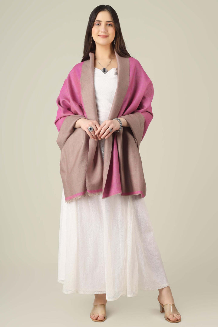 This reversible pashmina shawl pairs a sophisticated dusty taupe with a vibrant fuchsia pink, giving you two distinct looks in one luxurious wrap. 
    
      | pashmina shawls online | authentic Kashmiri pashmina shawl online | pure pashmina shawl online | original GI certified pashmina shawl online | luxury men's pashmina shawl online from Kashmir | where to buy online pure pashmina in India
    
    | GI Tag Certified - Government-verified authentic Kashmiri Pashmina
    | G20 Official Partner - Selected by India for G20 Summit gifting
    | Handicraft Registered - Official recognition of traditional craftsmanship
    | Certificate of Authenticity - Every purchase includes GI certification