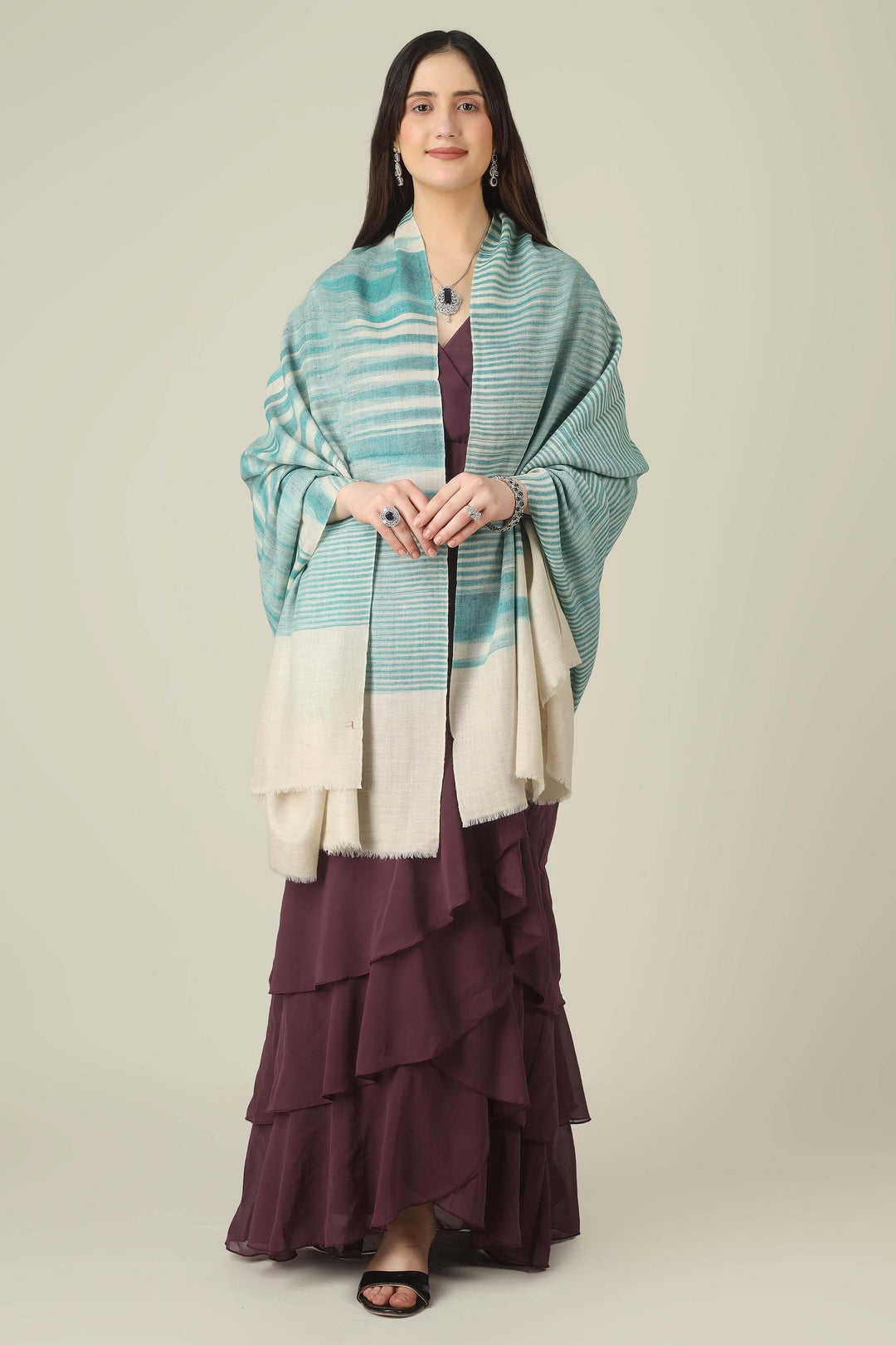 Perfect for customers searching for pashmina online, this aqua shawl brings easy elegance to wardrobes from Kashmir to style-conscious cities in Switzerland