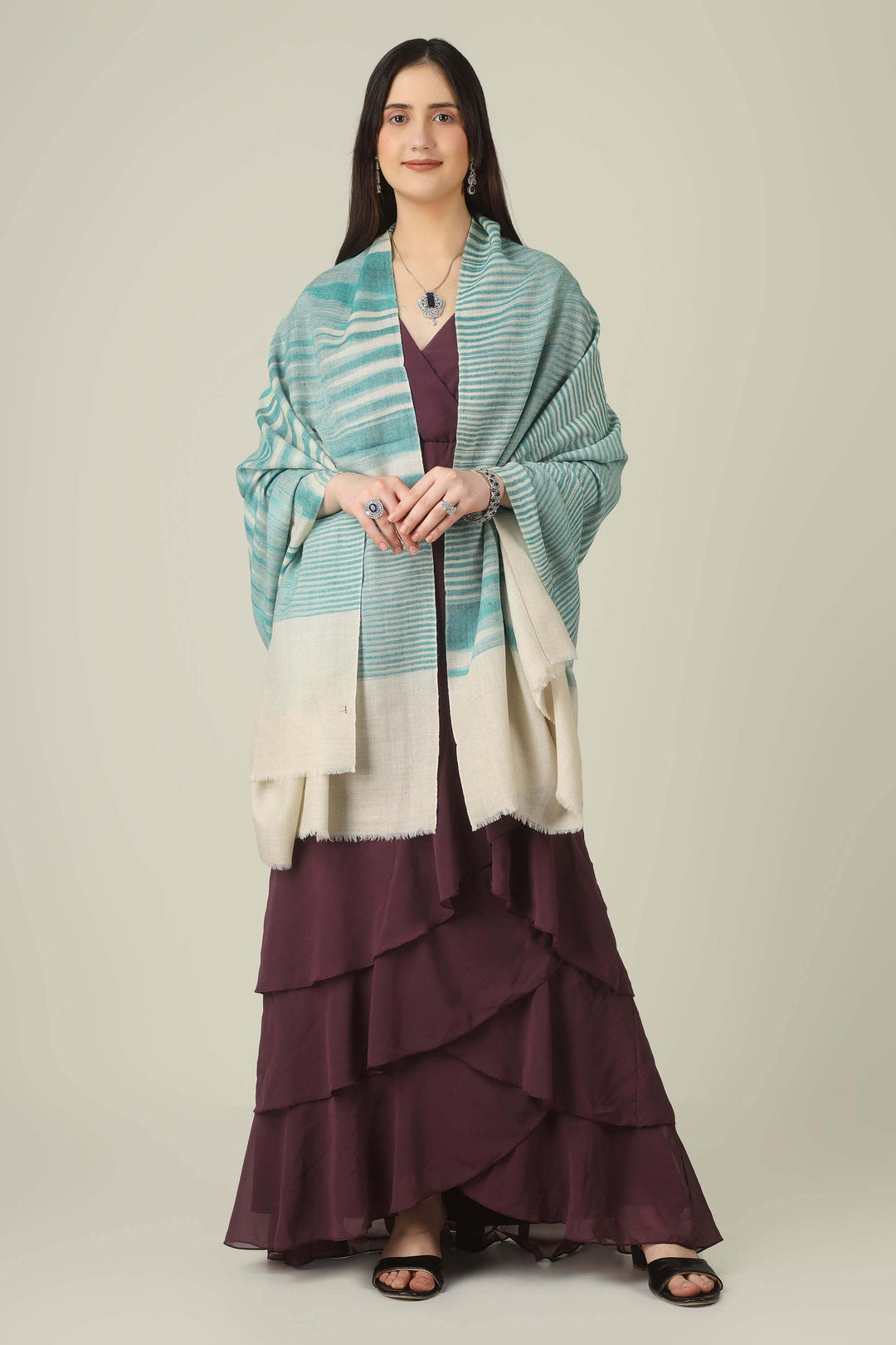 Perfect for customers searching for pashmina online, this aqua shawl brings easy elegance to wardrobes from Kashmir to style-conscious cities in Switzerland