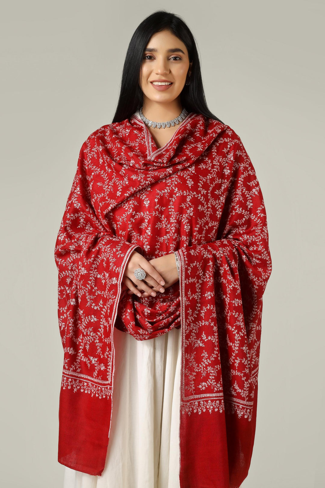 Perfect for admirers of luxury pashmina shawls across the USA, Canada, UK, Europe and the Middle East, this red jaldaar GI pashmina shawl brings authentic Kashmiri elegance to wardrobes worldwide