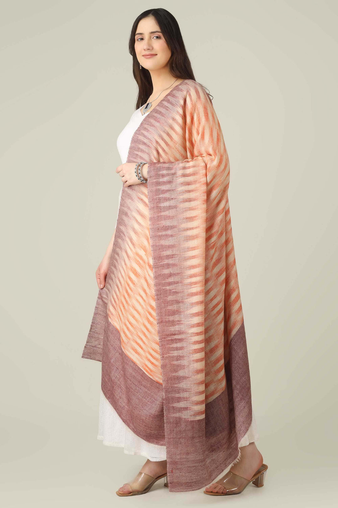 ideal for customers searching for a pure pashmina shawl online in India. It folds easily into a handbag or travel case yet instantly elevates your look whenever you drape it over your shoulders