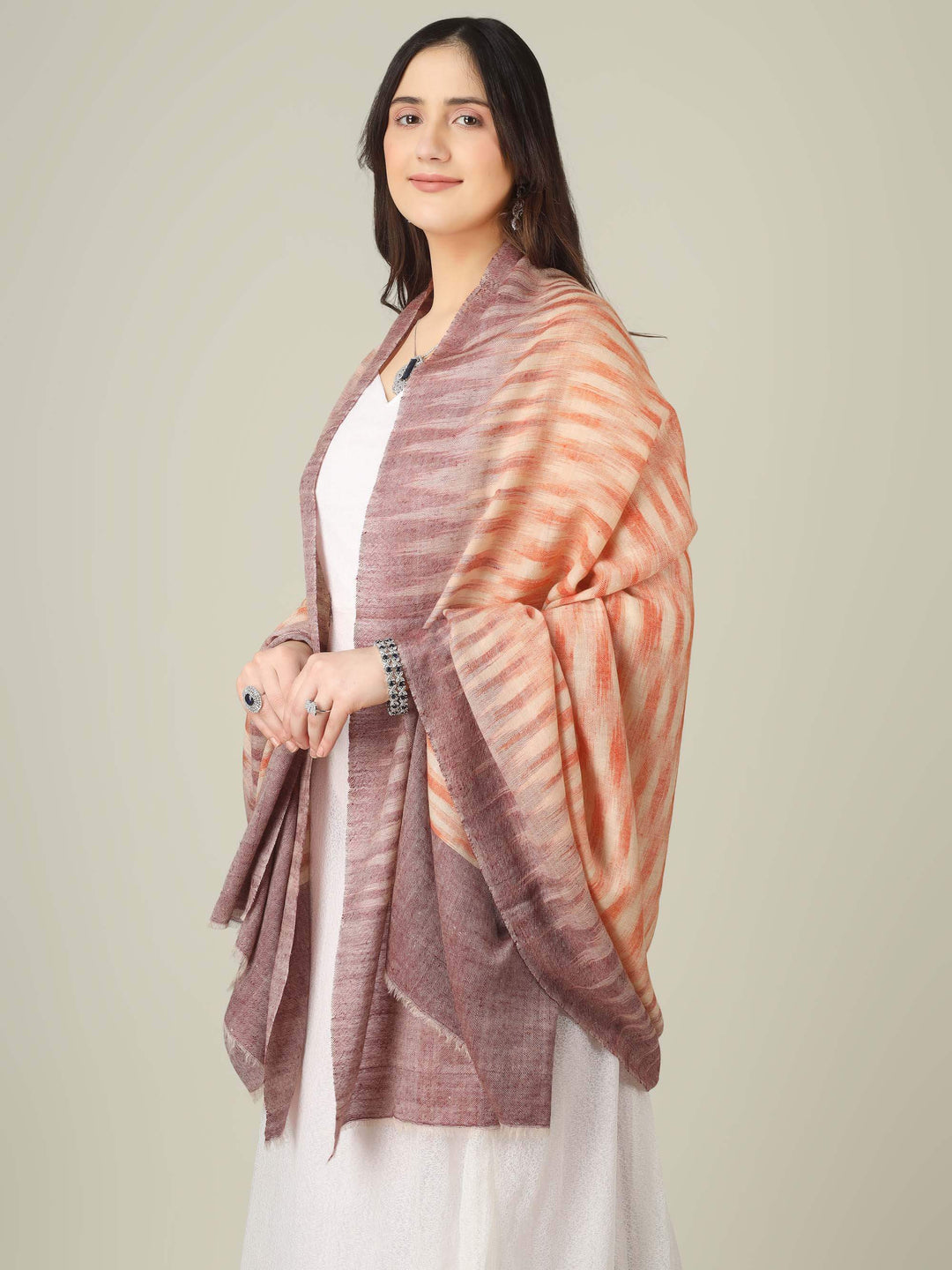 ideal for customers searching for a pure pashmina shawl online in India. It folds easily into a handbag or travel case yet instantly elevates your look whenever you drape it over your shoulders