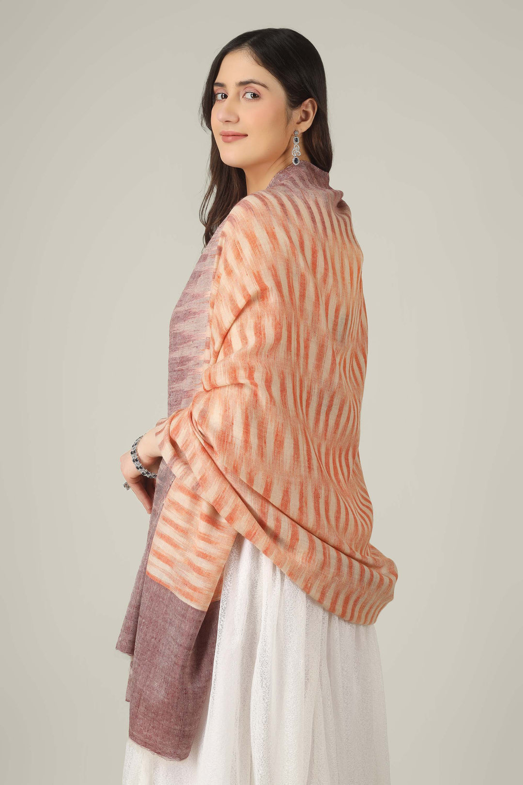 ideal for customers searching for a pure pashmina shawl online in India. It folds easily into a handbag or travel case yet instantly elevates your look whenever you drape it over your shoulders