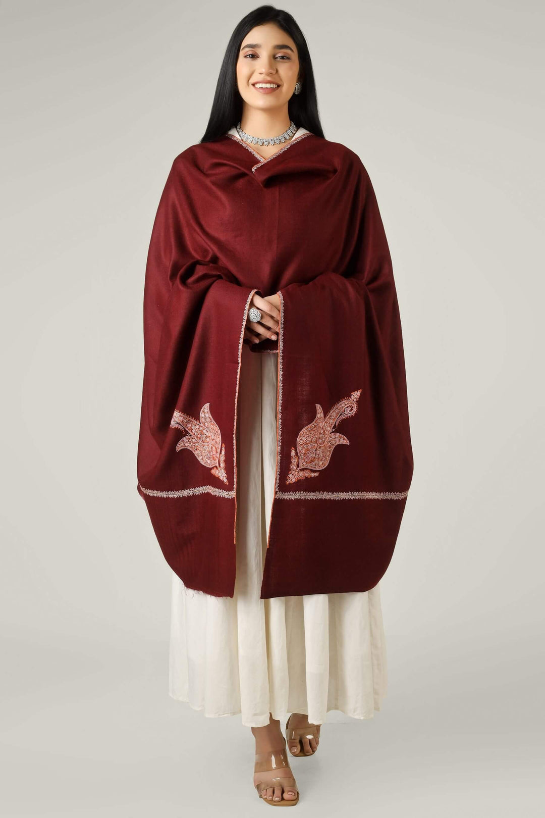 Perfect for admirers of luxury pashmina shawls across the USA, Canada, UK, Europe and the Middle East, this maroon sozni  pashmina shawl brings authentic Kashmiri sophistication to wardrobes worldwide.
