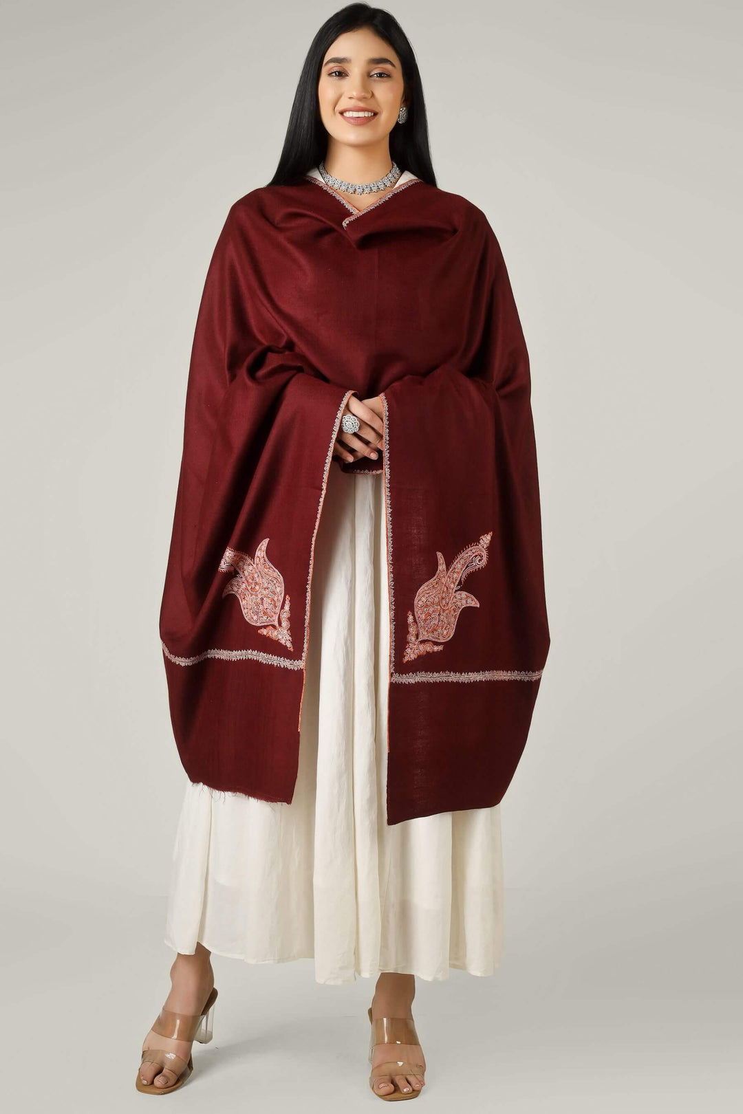 Perfect for admirers of luxury pashmina shawls across the USA, Canada, UK, Europe and the Middle East, this maroon sozni  pashmina shawl brings authentic Kashmiri sophistication to wardrobes worldwide.
