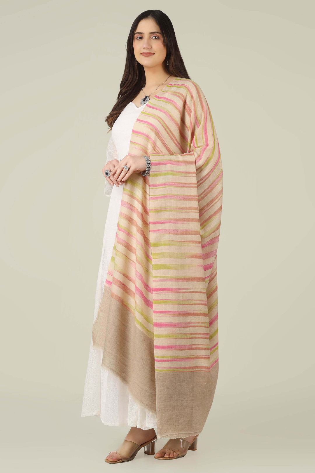 This pure pashmina shawl features a natural beige base scattered with fine horizontal stripes in blush pink, peach, and soft lime