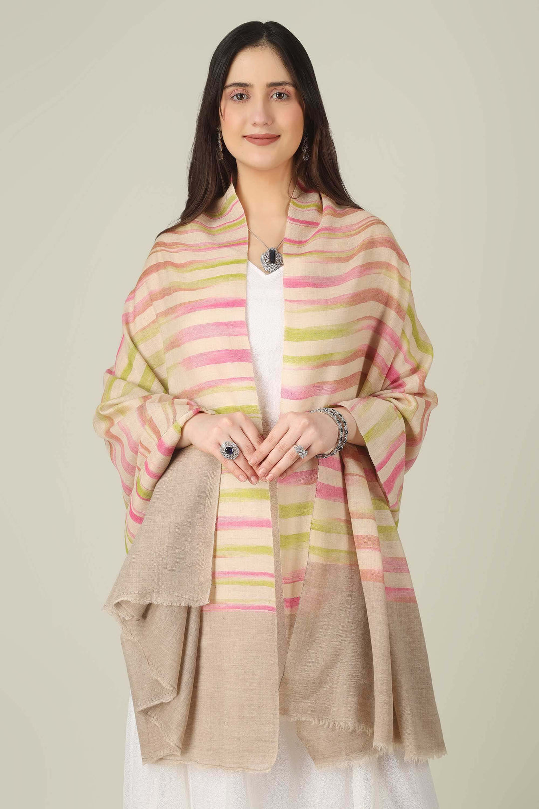 This pure pashmina shawl features a natural beige base scattered with fine horizontal stripes in blush pink, peach, and soft lime