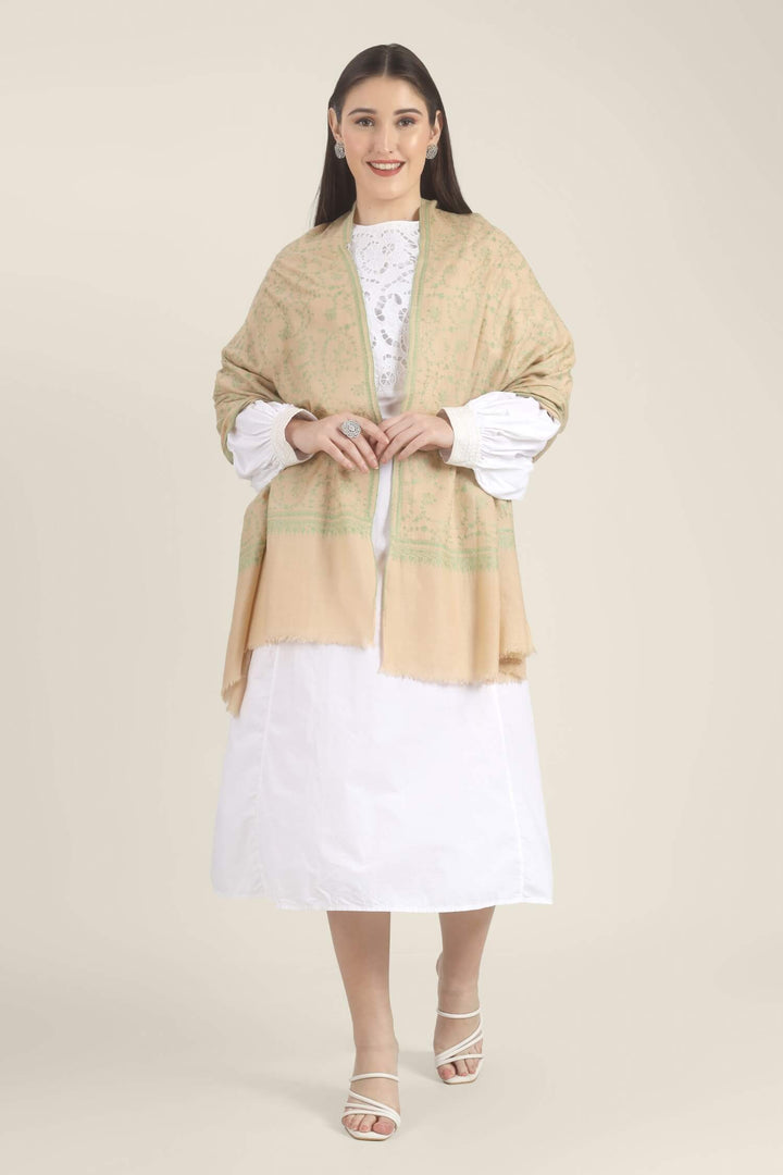 Model wearing a beige GI Kashmiri Pure Pashmina stole with soft green floral jaal Sozni embroidery over a white outfit.
    
      | pashmina shawls online | authentic Kashmiri pashmina shawl online | pure pashmina shawl online | original GI certified pashmina shawl online | luxury men's pashmina shawl online from Kashmir | where to buy online pure pashmina in India
    
    | GI Tag Certified - Government-verified authentic Kashmiri Pashmina
    | G20 Official Partner - Selected by India for G20 Summit gifting
    | Handicraft Registered - Official recognition of traditional craftsmanship
    | Certificate of Authenticity - Every purchase includes GI certification