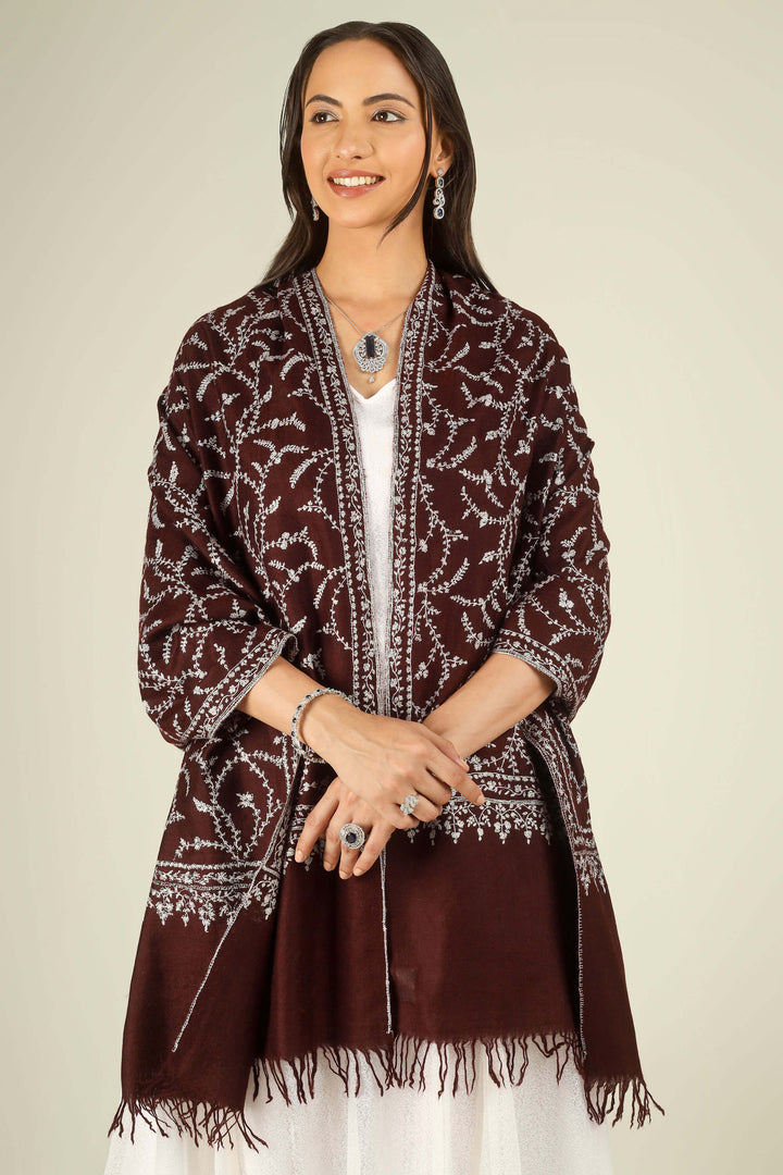GI maroon Kashmiri pure pashmina embroidered stole by Kepra, draped on smiling model in white dress, front view for Kolkata winter styling
    
      | pashmina shawls online | authentic Kashmiri pashmina shawl online | pure pashmina shawl online | original GI certified pashmina shawl online | luxury men's pashmina shawl online from Kashmir | where to buy online pure pashmina in India
    
    | GI Tag Certified - Government-verified authentic Kashmiri Pashmina
    | G20 Official Partner - Selected by India for G20 Summit gifting
    | Handicraft Registered - Official recognition of traditional craftsmanship
    | Certificate of Authenticity - Every purchase includes GI certification