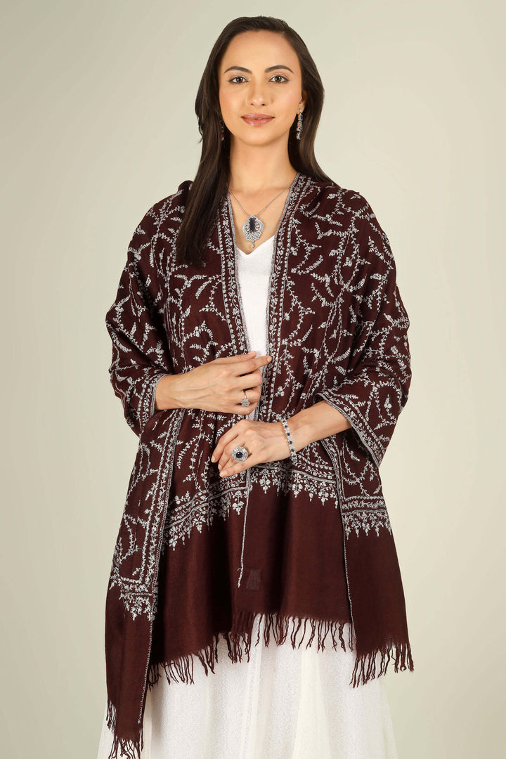 GI maroon Kashmiri pure pashmina embroidered stole by Kepra, draped on smiling model in white dress, front view for Kolkata winter styling
    
      | pashmina shawls online | authentic Kashmiri pashmina shawl online | pure pashmina shawl online | original GI certified pashmina shawl online | luxury men's pashmina shawl online from Kashmir | where to buy online pure pashmina in India
    
    | GI Tag Certified - Government-verified authentic Kashmiri Pashmina
    | G20 Official Partner - Selected by India for G20 Summit gifting
    | Handicraft Registered - Official recognition of traditional craftsmanship
    | Certificate of Authenticity - Every purchase includes GI certification