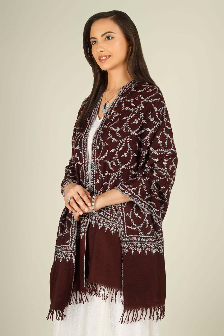 GI maroon Kashmiri pure pashmina embroidered stole by Kepra, draped on smiling model in white dress, front view for Kolkata winter styling
    
      | pashmina shawls online | authentic Kashmiri pashmina shawl online | pure pashmina shawl online | original GI certified pashmina shawl online | luxury men's pashmina shawl online from Kashmir | where to buy online pure pashmina in India
    
    | GI Tag Certified - Government-verified authentic Kashmiri Pashmina
    | G20 Official Partner - Selected by India for G20 Summit gifting
    | Handicraft Registered - Official recognition of traditional craftsmanship
    | Certificate of Authenticity - Every purchase includes GI certification