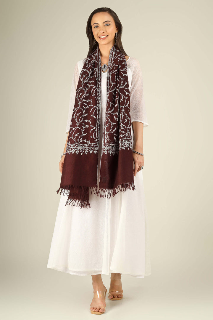 GI maroon Kashmiri pure pashmina embroidered stole by Kepra, draped on smiling model in white dress, front view for Kolkata winter styling
    
      | pashmina shawls online | authentic Kashmiri pashmina shawl online | pure pashmina shawl online | original GI certified pashmina shawl online | luxury men's pashmina shawl online from Kashmir | where to buy online pure pashmina in India
    
    | GI Tag Certified - Government-verified authentic Kashmiri Pashmina
    | G20 Official Partner - Selected by India for G20 Summit gifting
    | Handicraft Registered - Official recognition of traditional craftsmanship
    | Certificate of Authenticity - Every purchase includes GI certification
