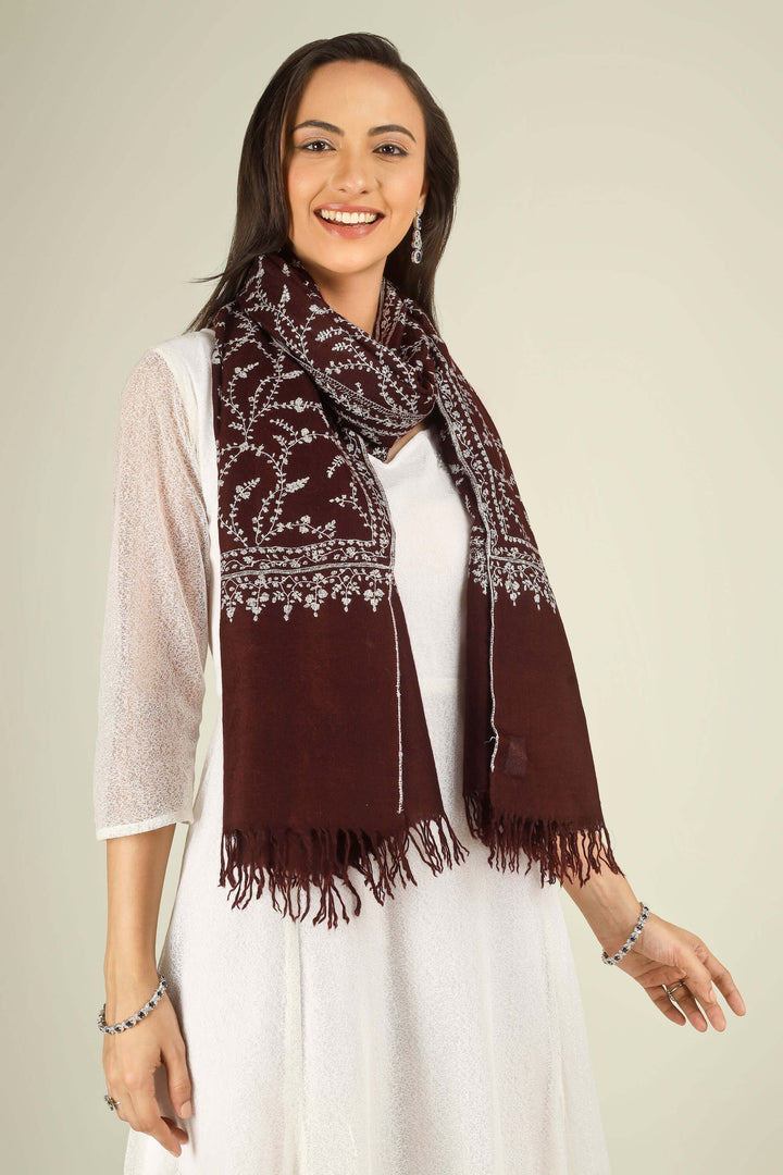 GI maroon Kashmiri pure pashmina embroidered stole by Kepra, draped on smiling model in white dress, front view for Kolkata winter styling
    
      | pashmina shawls online | authentic Kashmiri pashmina shawl online | pure pashmina shawl online | original GI certified pashmina shawl online | luxury men's pashmina shawl online from Kashmir | where to buy online pure pashmina in India
    
    | GI Tag Certified - Government-verified authentic Kashmiri Pashmina
    | G20 Official Partner - Selected by India for G20 Summit gifting
    | Handicraft Registered - Official recognition of traditional craftsmanship
    | Certificate of Authenticity - Every purchase includes GI certification