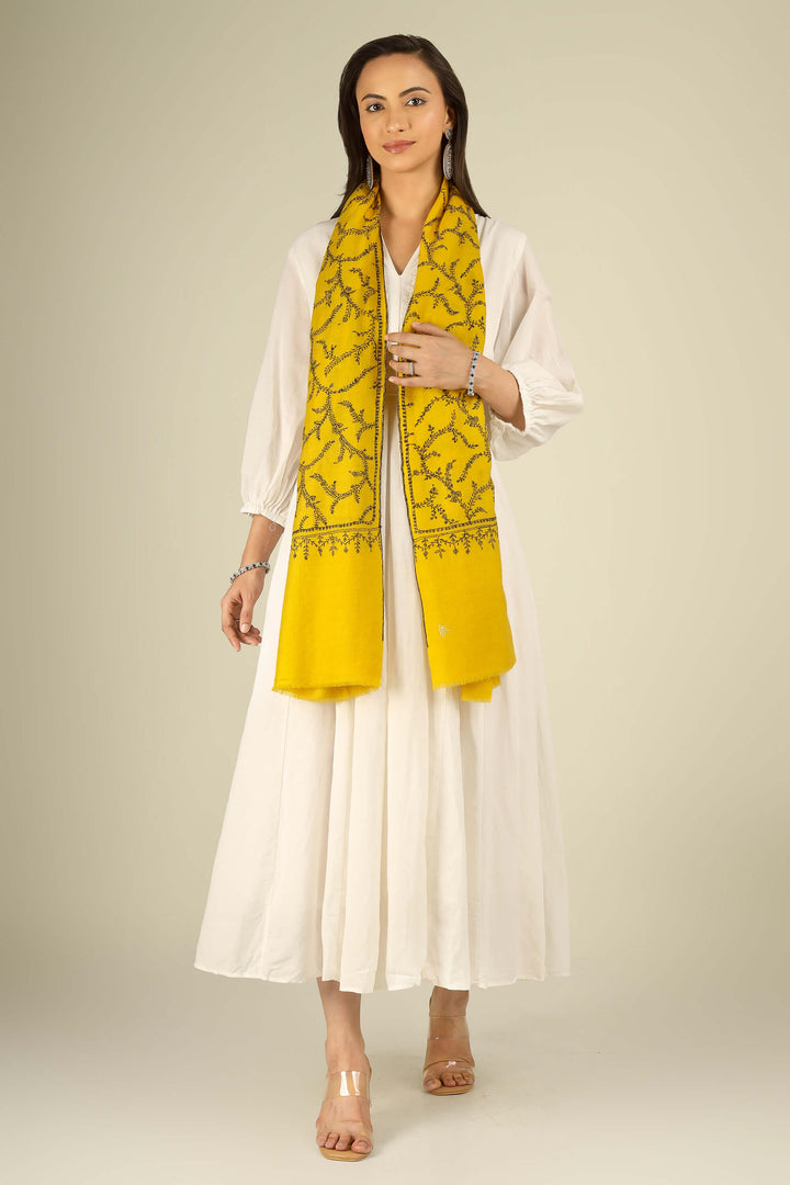 Yellow Kashmiri pure pashmina embroidered stole by Kepra, draped on smiling model in white dress, full-length front view for London winter styling
    
      | pashmina shawls online | authentic Kashmiri pashmina shawl online | pure pashmina shawl online | original GI certified pashmina shawl online | luxury men's pashmina shawl online from Kashmir | where to buy online pure pashmina in India
    
    | GI Tag Certified - Government-verified authentic Kashmiri Pashmina
    | G20 Official Partner - Selected by India for G20 Summit gifting
    | Handicraft Registered - Official recognition of traditional craftsmanship
    | Certificate of Authenticity - Every purchase includes GI certification
