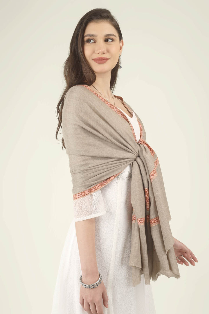 This Beige Pure Kashmiri Pashmina Paisley Embroidered Stole features a soft natural beige body decorated with richly worked paisley motifs and framed borders in rust, coral and pink.
    
      | pashmina shawls online | authentic Kashmiri pashmina shawl online | pure pashmina shawl online | original GI certified pashmina shawl online | luxury men's pashmina shawl online from Kashmir | where to buy online pure pashmina in India
    
    | GI Tag Certified - Government-verified authentic Kashmiri Pashmina
    | G20 Official Partner - Selected by India for G20 Summit gifting
    | Handicraft Registered - Official recognition of traditional craftsmanship
    | Certificate of Authenticity - Every purchase includes GI certification