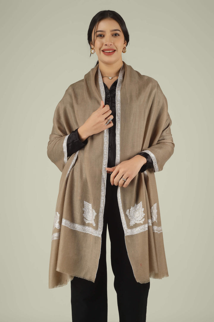 Hand-embroidered natural taupe pure Pashmina stole featuring ivory Sozni corner paisley motifs and a delicate Hashidaar border from Kepra.
    
      | pashmina shawls online | authentic Kashmiri pashmina shawl online | pure pashmina shawl online | original GI certified pashmina shawl online | luxury men's pashmina shawl online from Kashmir | where to buy online pure pashmina in India
    
    | GI Tag Certified - Government-verified authentic Kashmiri Pashmina
    | G20 Official Partner - Selected by India for G20 Summit gifting
    | Handicraft Registered - Official recognition of traditional craftsmanship
    | Certificate of Authenticity - Every purchase includes GI certification