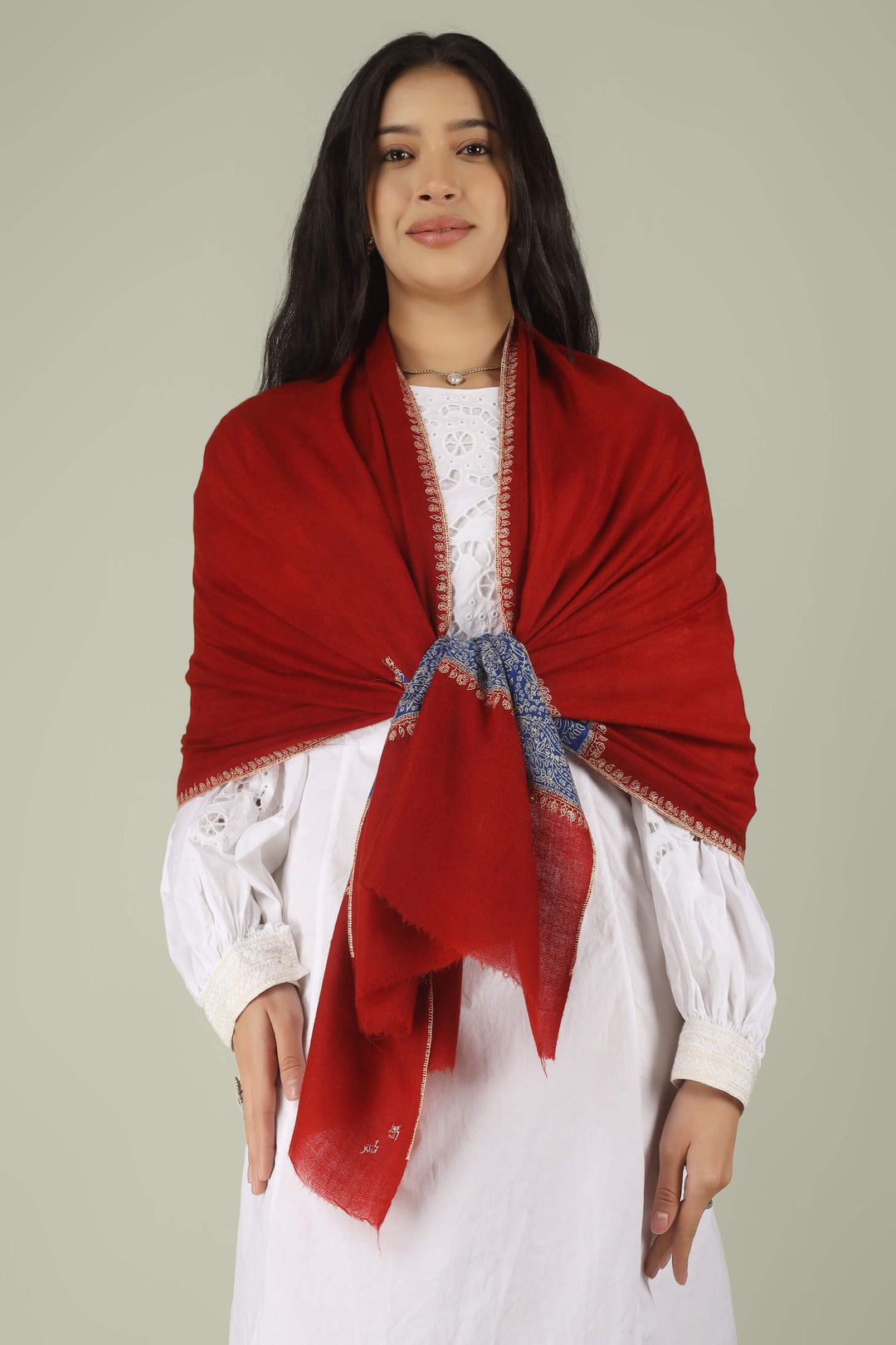 Hand-embroidered ruby red pure Pashmina stole with royal blue Paladaar panels and ivory Sozni needlework from Kepra.
