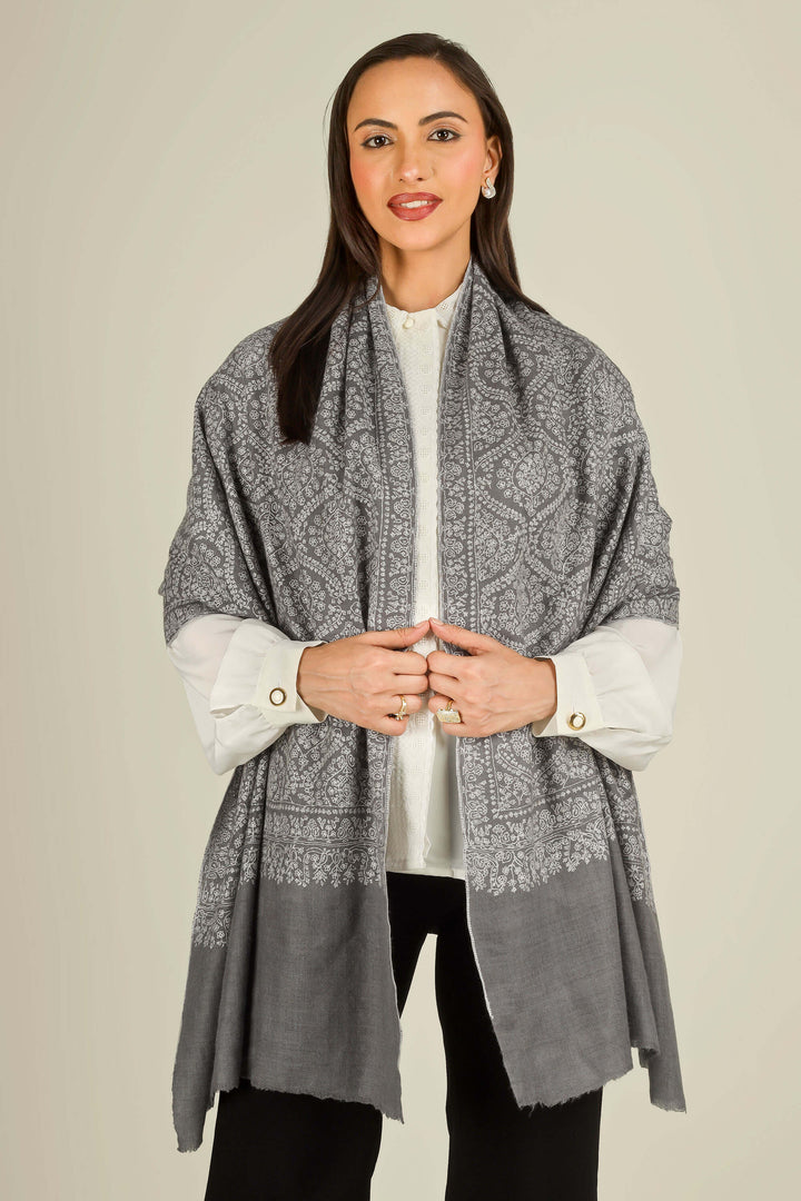 GI grey Kashmiri pure pashmina embroidered stole by Kepra, draped on smiling model over white shirt and black trousers, front view
    
      | pashmina shawls online | authentic Kashmiri pashmina shawl online | pure pashmina shawl online | original GI certified pashmina shawl online | luxury men's pashmina shawl online from Kashmir | where to buy online pure pashmina in India
    
    | GI Tag Certified - Government-verified authentic Kashmiri Pashmina
    | G20 Official Partner - Selected by India for G20 Summit gifting
    | Handicraft Registered - Official recognition of traditional craftsmanship
    | Certificate of Authenticity - Every purchase includes GI certification