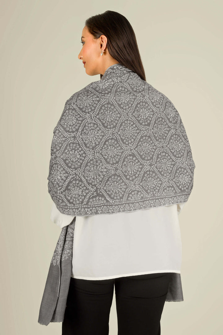 GI grey Kashmiri pure pashmina embroidered stole by Kepra, draped on smiling model over white shirt and black trousers, front view
    
      | pashmina shawls online | authentic Kashmiri pashmina shawl online | pure pashmina shawl online | original GI certified pashmina shawl online | luxury men's pashmina shawl online from Kashmir | where to buy online pure pashmina in India
    
    | GI Tag Certified - Government-verified authentic Kashmiri Pashmina
    | G20 Official Partner - Selected by India for G20 Summit gifting
    | Handicraft Registered - Official recognition of traditional craftsmanship
    | Certificate of Authenticity - Every purchase includes GI certification