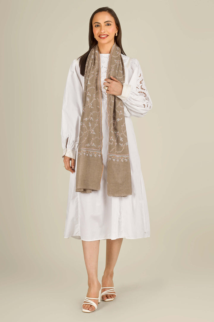 GI taupe Kashmiri pure pashmina embroidered stole by Kepra, draped over white dress on smiling model, front view
    
      | pashmina shawls online | authentic Kashmiri pashmina shawl online | pure pashmina shawl online | original GI certified pashmina shawl online | luxury men's pashmina shawl online from Kashmir | where to buy online pure pashmina in India
    
    | GI Tag Certified - Government-verified authentic Kashmiri Pashmina
    | G20 Official Partner - Selected by India for G20 Summit gifting
    | Handicraft Registered - Official recognition of traditional craftsmanship
    | Certificate of Authenticity - Every purchase includes GI certification